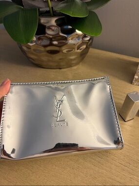 Yves Saint Laurent Silver Metallic Pouch with free Red Lipstick